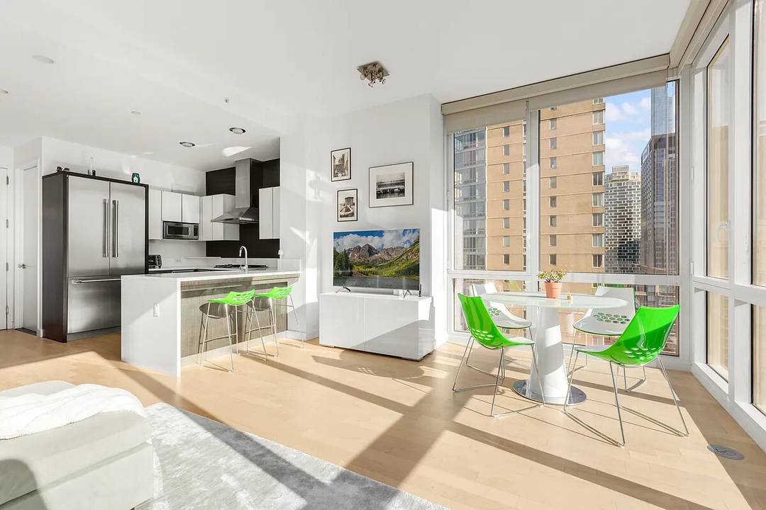 TOP FLOOR IN THE LINE ! Bathed in light and framed by 10 foot ceilings and floor to ceiling glass, this 1, 001 square foot one bedroom, 1.