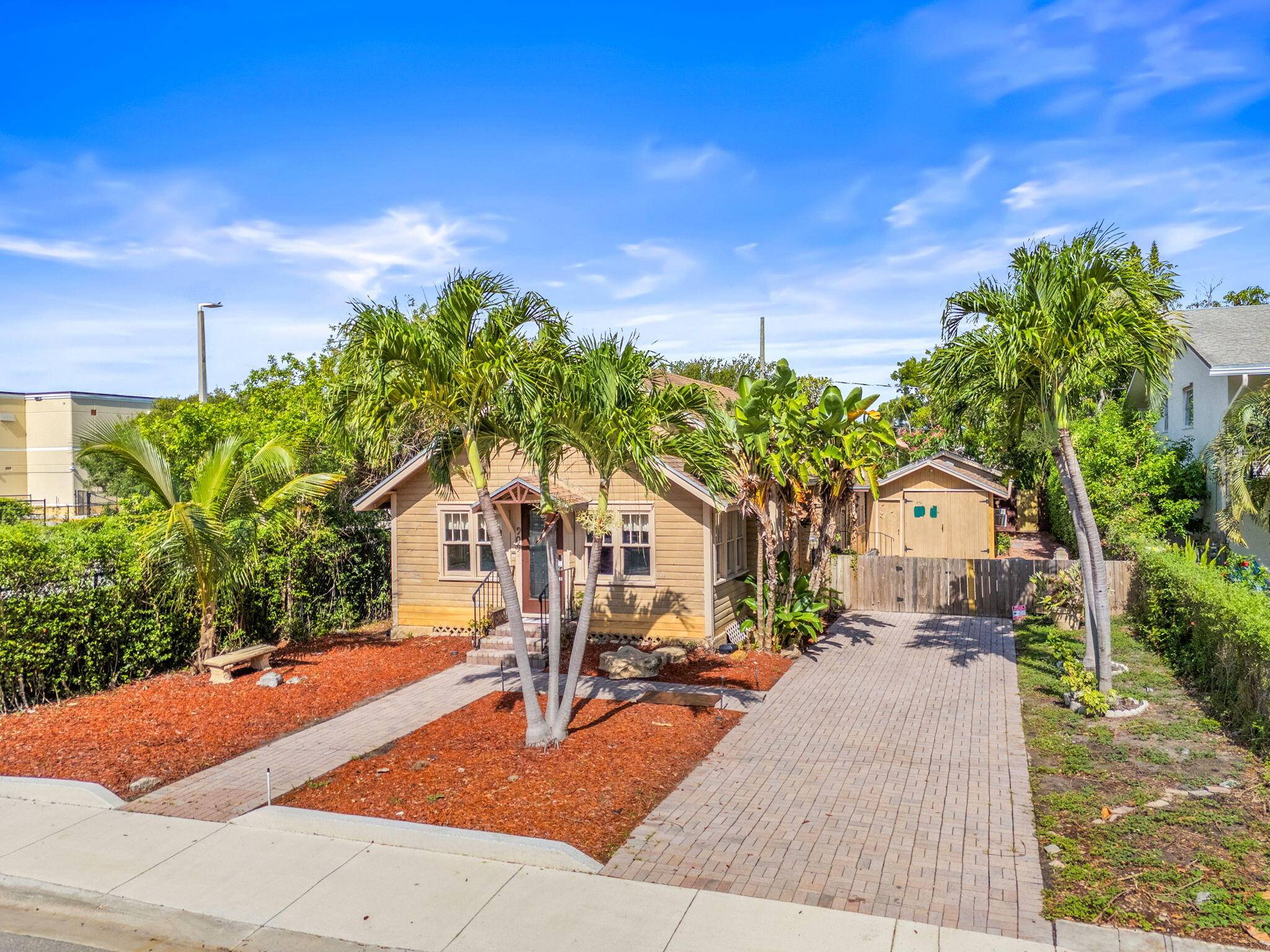 Incredible opportunity to own a one of a kind bungalow in the heart of Lake Worth Beach's historic district featured in the book ''The Cottages of Lake Worth'' !