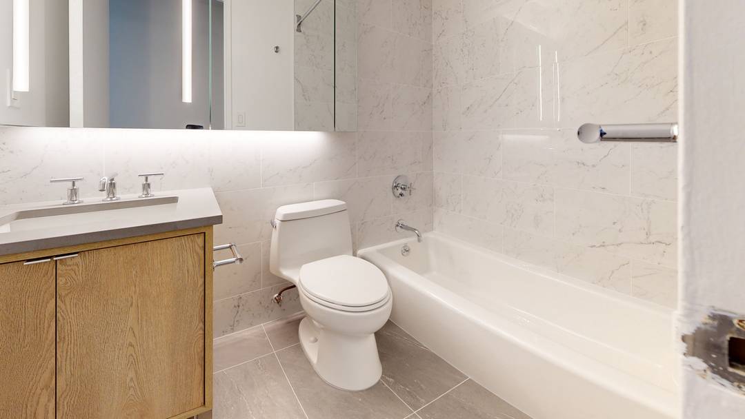 Great one bedroom with private balcony, flexible floor plan with space for a dedicated dining or home office space, and gourmet kitchen with stainless steel appliances and stone countertops.