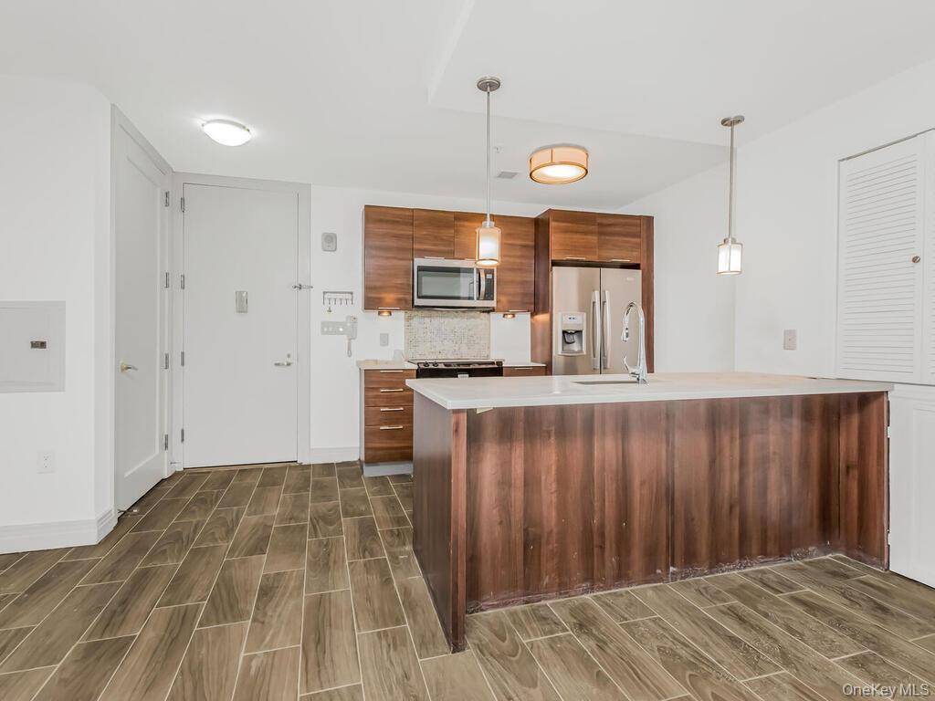 Welcome home to this beautifully appointed 1 bedroom apartment in the heart of Ridge Hill, offering the perfect blend of modern living and outdoor space.