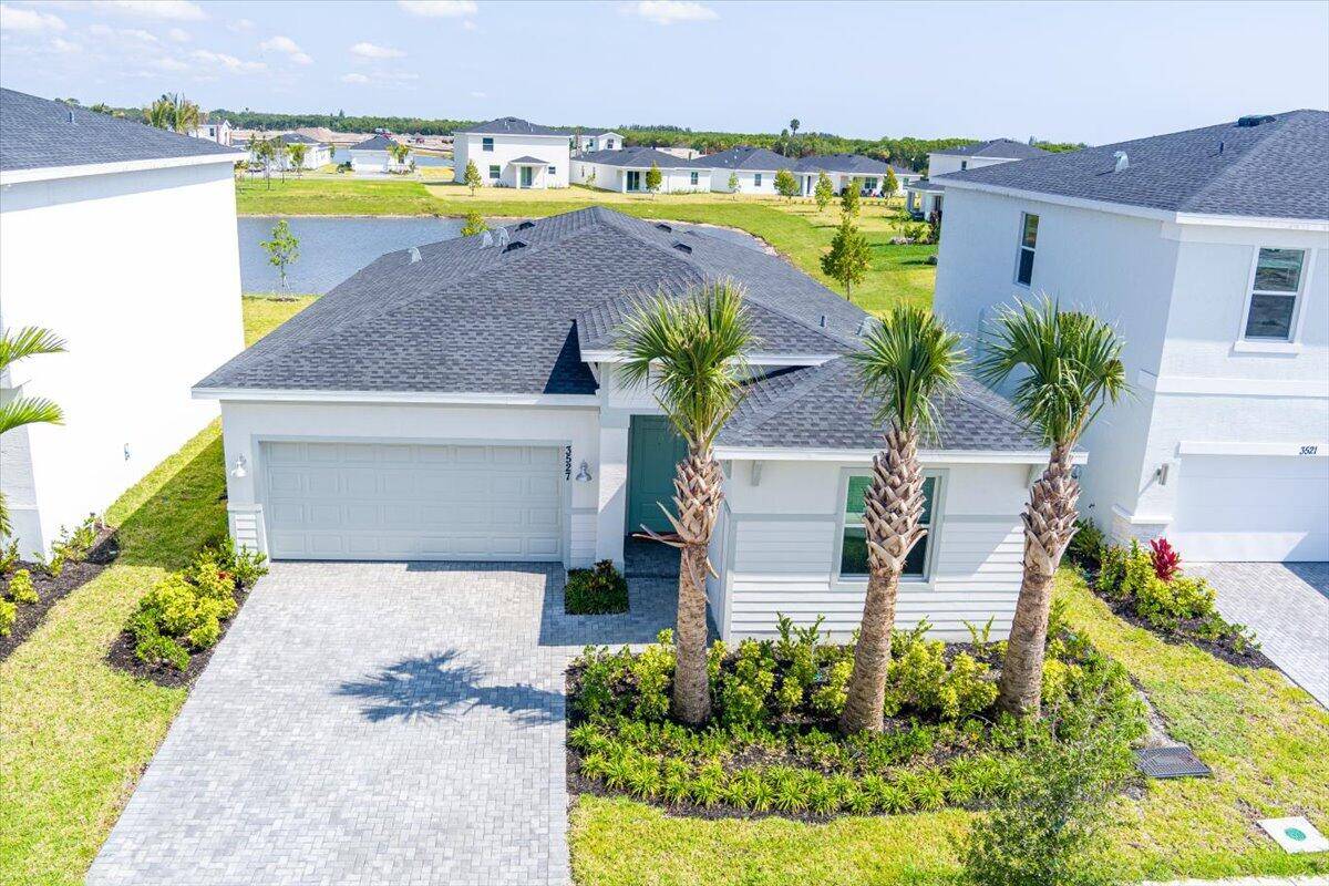 This charming single story home offers an open concept living space complete with a Great Room, dining room and kitchen that connect directly to a covered patio.