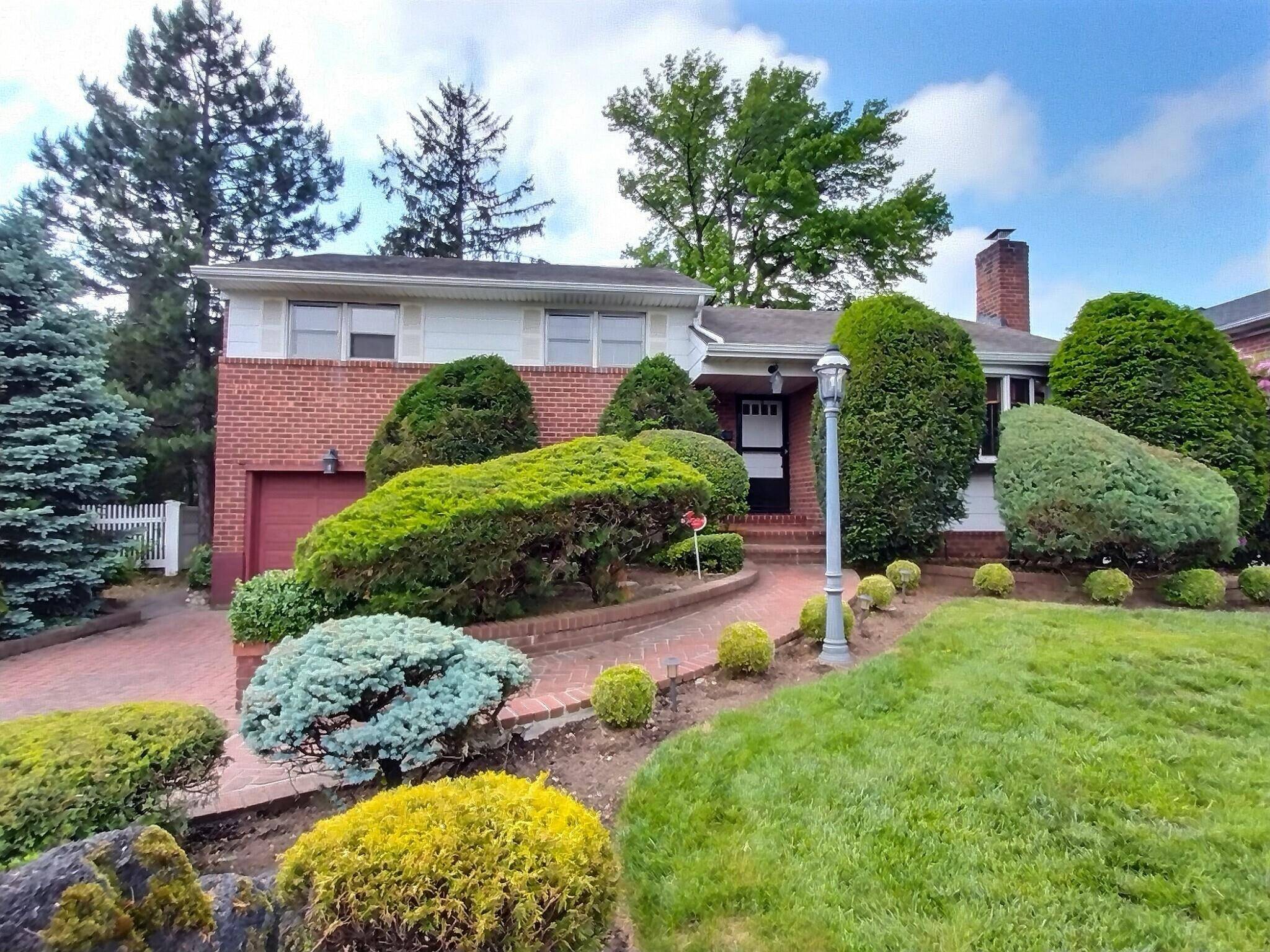 Garden City School District with views across the street of the Cherry Valley Golf Course !