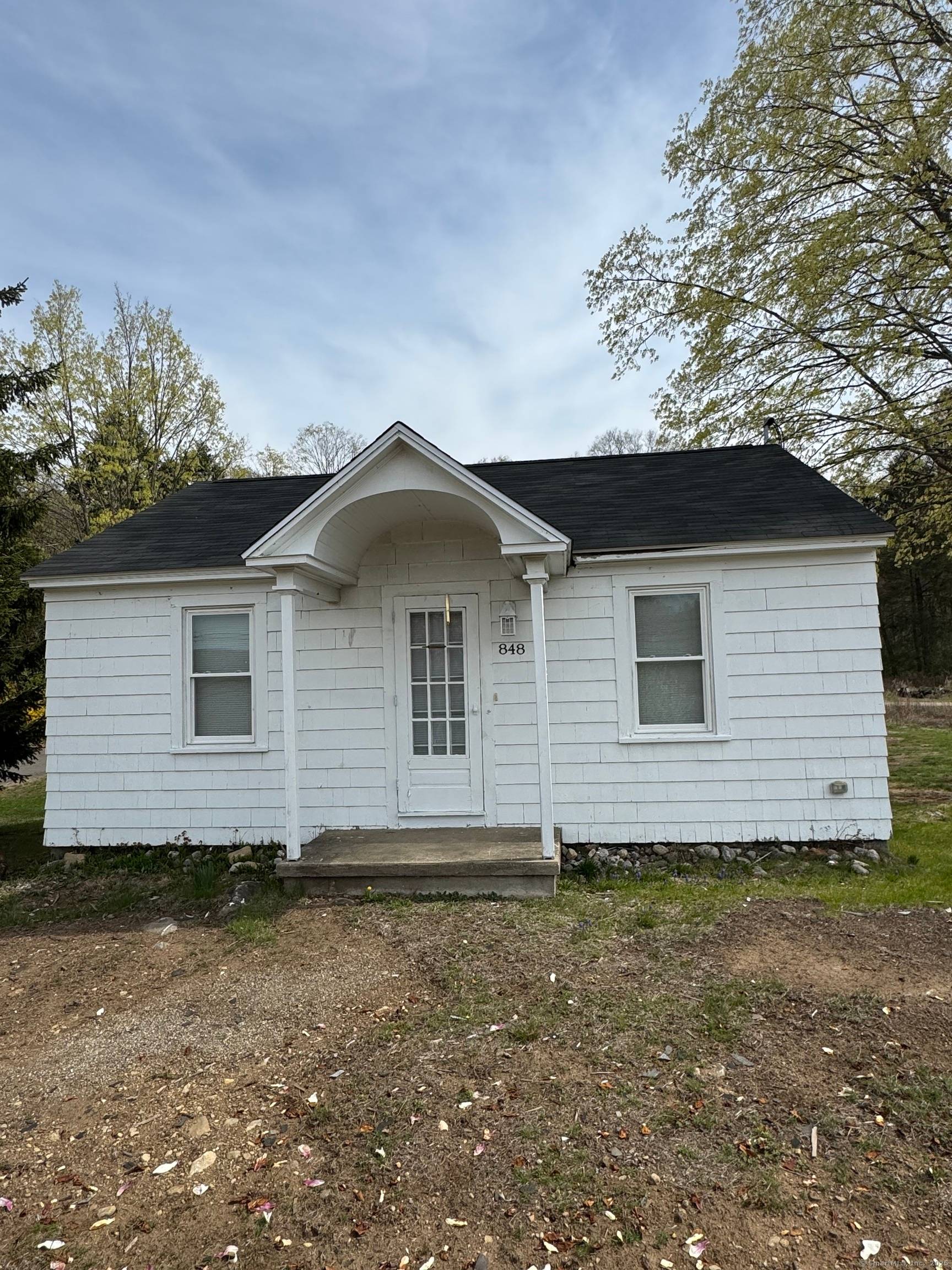 Ranch on 4 acres located in commercial district.