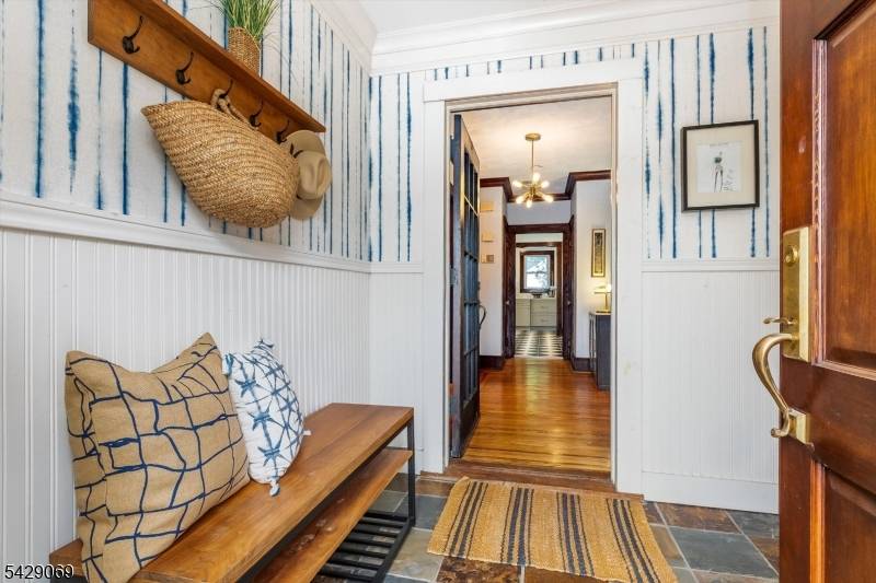 Beautifully updated Colonial offering the perfect blend of timeless character and modern convenience in a prime Maplewood location.