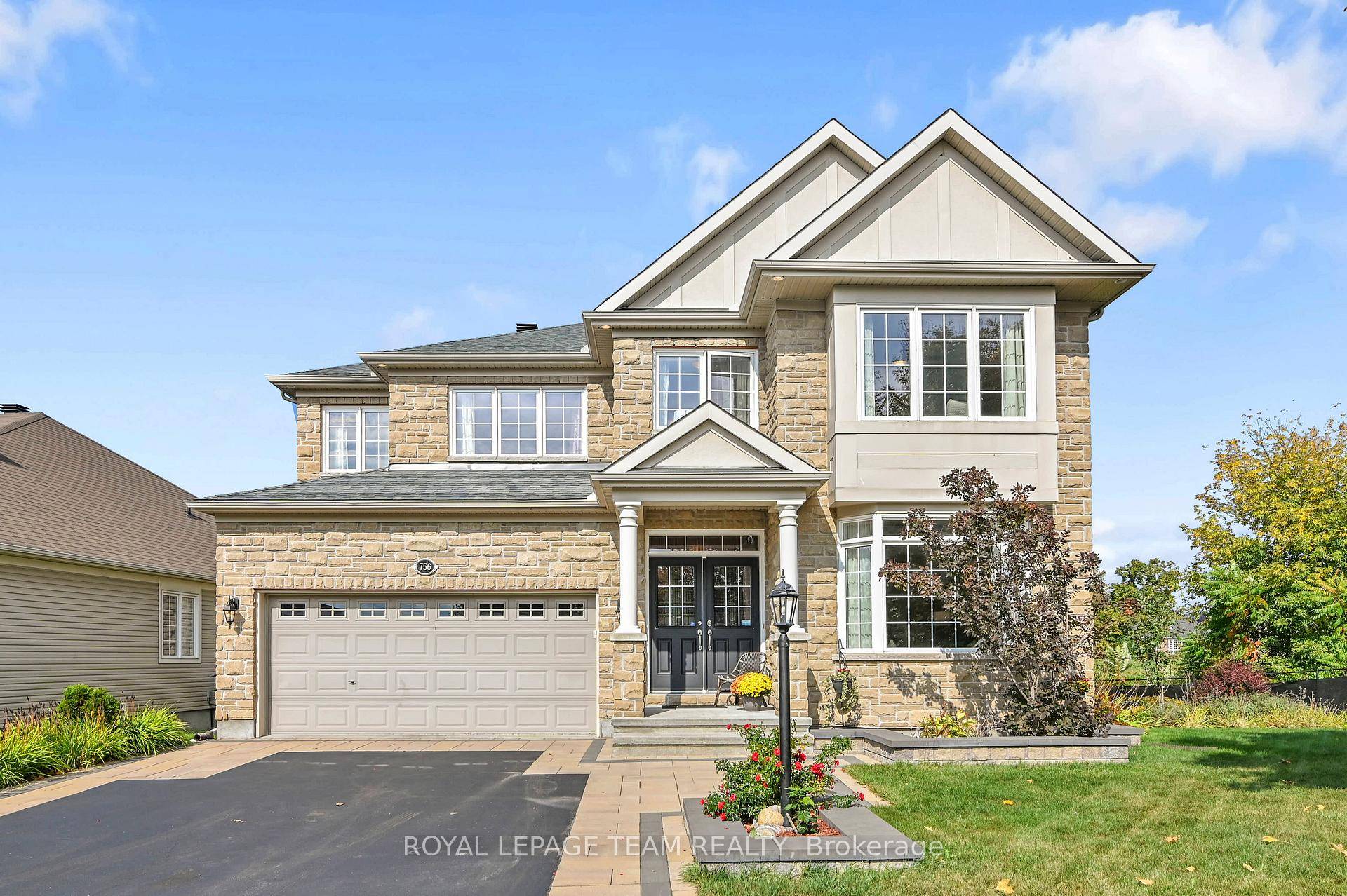 Welcome to this stunning 4 bedroom, 5 bathroom, executive home backing on the picturesque 4th hole of Stonebridge golf course.