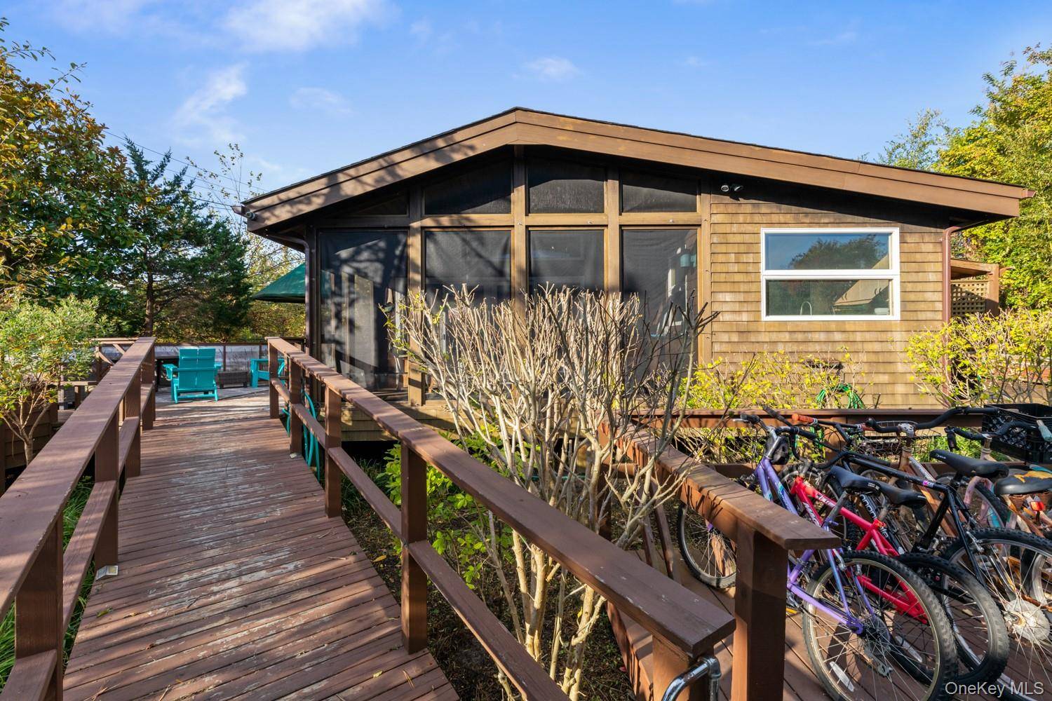 Experience the perfect blend of classic Fire Island charm and modern updates at 19 Crescent Avenue in Seaview.