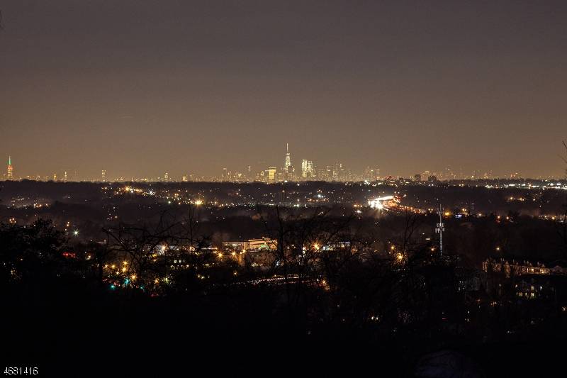 Warm and welcoming home on Summit's Northside enjoys gorgeous NYC skyline views year round.