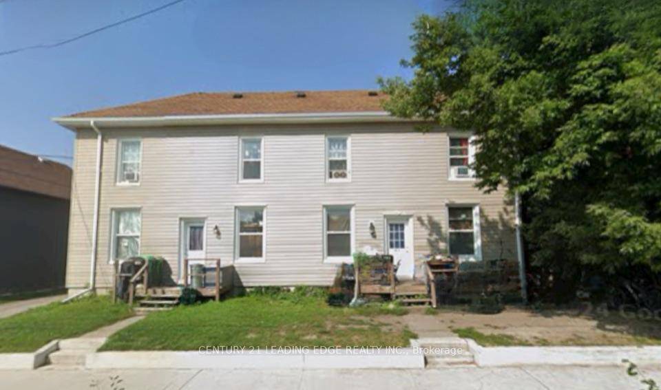 Purpose built 4 Self contained Apartments Two 1 bedroom units on main level with basement, Two 2 bedroom units on second level.
