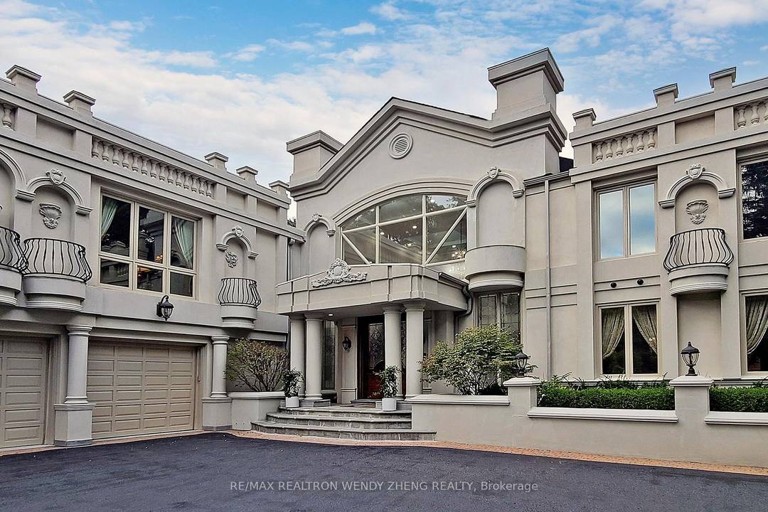 Sophisticated living awaits in this prestigious Woodland Acres residence, offering approx.