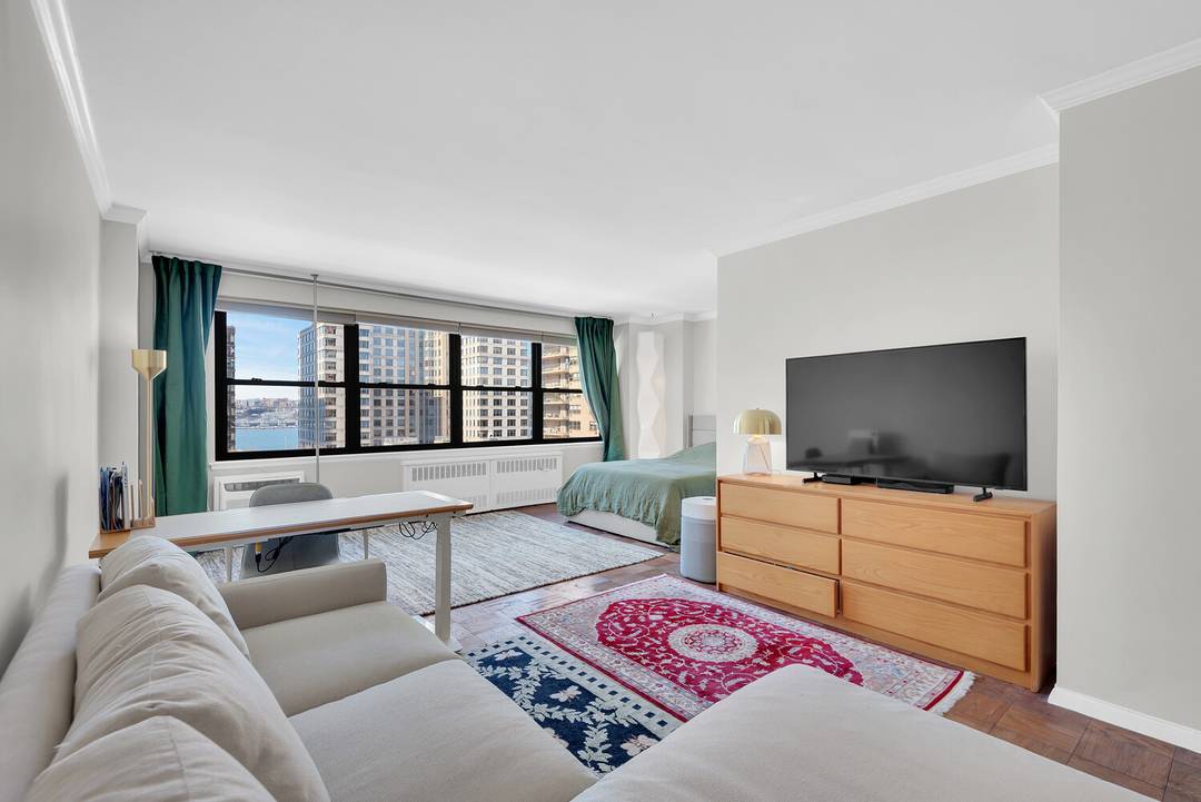Enjoy beautiful western views of the Hudson River and Lincoln Towers' private five acre park from this spacious and pin drop quiet alcove studio at 185 West End Avenue.