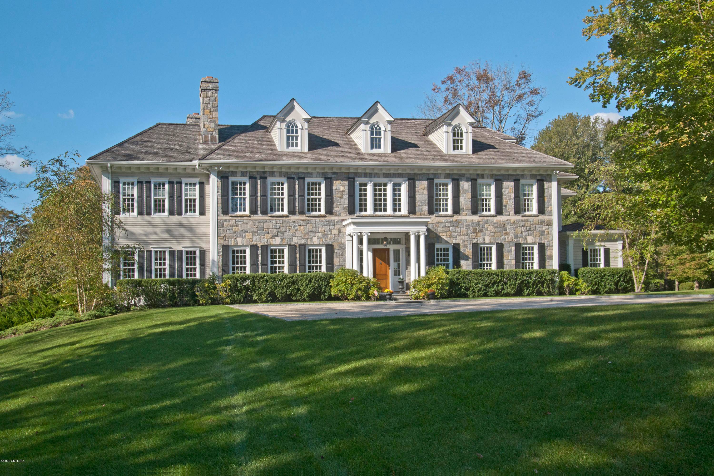 An Incredible opportunity to move right into this impeccably maintained Georgian colonial quietly located at the end of a private cul de sac off Lake Ave.