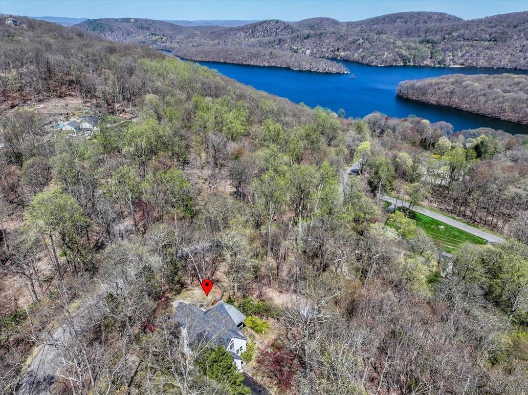 Tucked away at the private end of a cul de sac in desirable Sherman and just minutes from Candlewood Lake, this charming Cape offers great space, and a peaceful setting ...