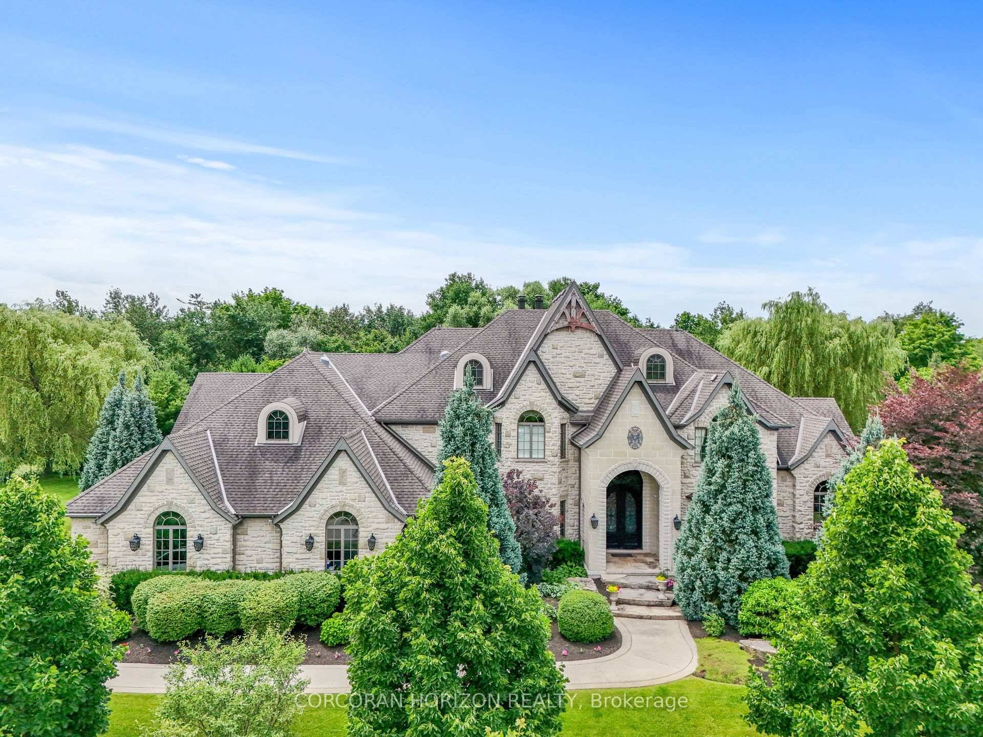 Nestled on a picturesque, forested lot backing onto a protected green space in an exclusive neighborhood, this stunning two story estate is just minutes from Hwy 401 and all major ...