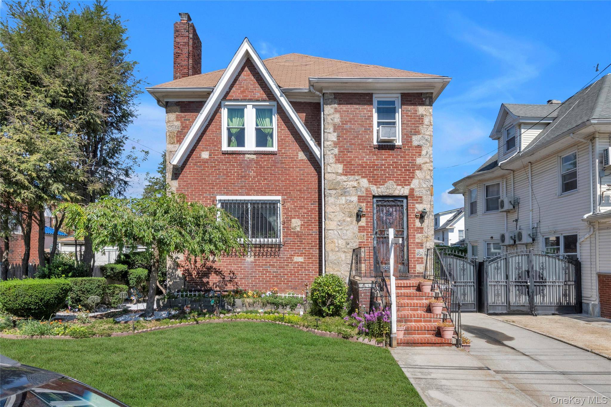 Step into Tudor fairytale living in the heart of Flushing !