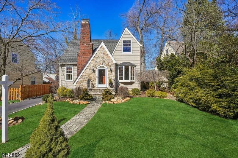 Enchanting 3 4 bedroom, 2 bath English Tudor blends timeless architecture with modern comfort.