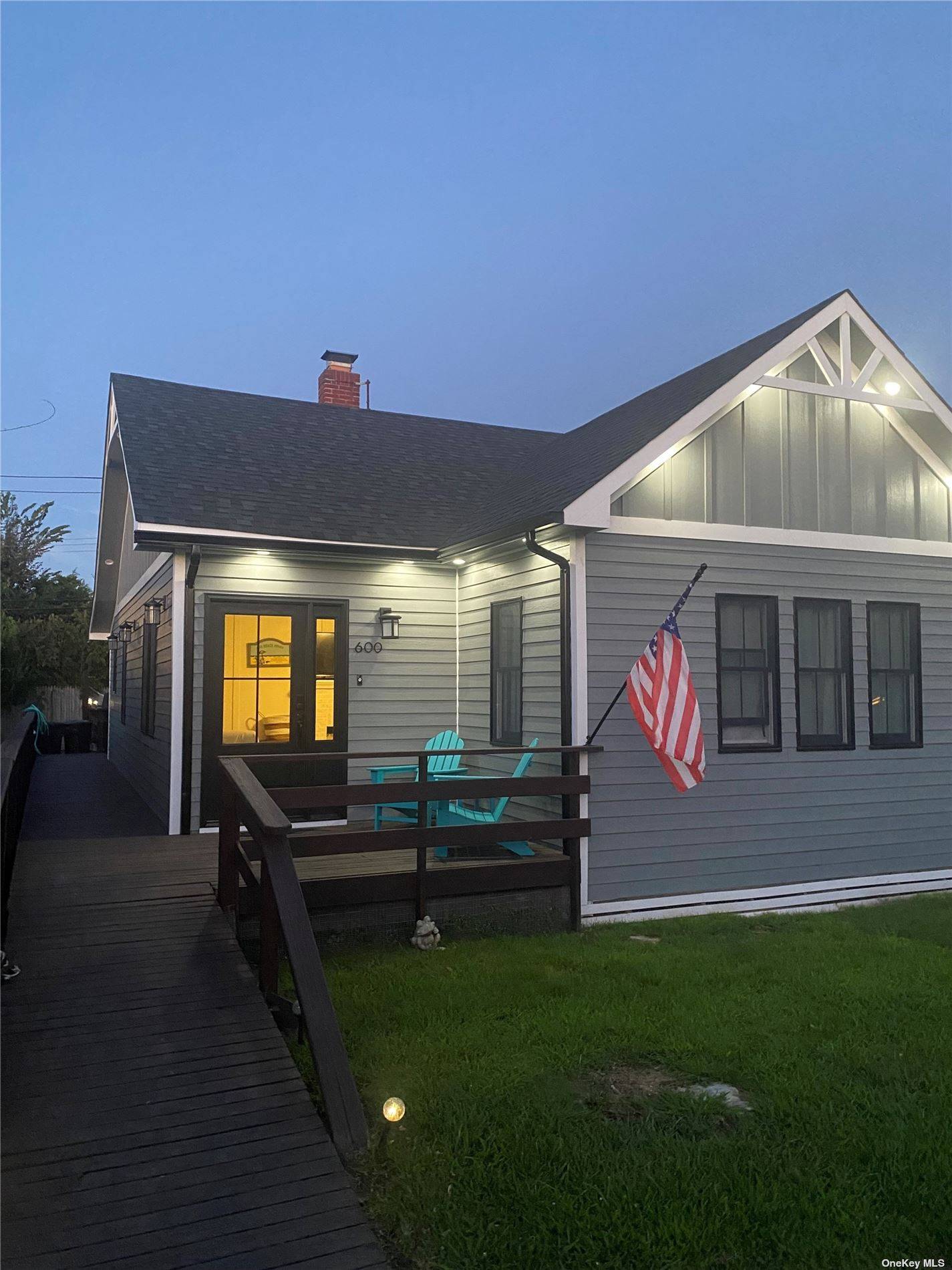 This 4 bedroom, 2 full bath beach house, centrally situated near the beach and town, features a spacious private back deck.