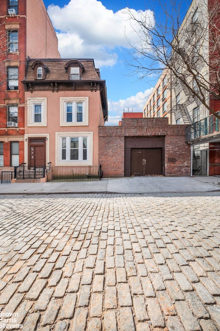 Rare Townhouse amp ; Garage Combination in East Harlem Prime Development Potential A truly unique find in East Harlem, this three family townhouse with an attached garage offers an exceptional ...