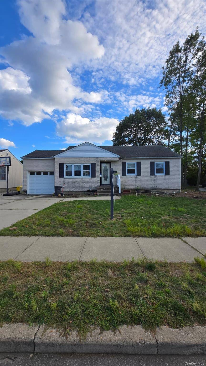 Welcome to 3 Bentley Road in Plainview.