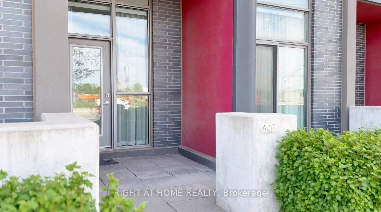 Stunning Two Storey Ground Floor Condo with Private Street Access amp ; Premium Amenities.