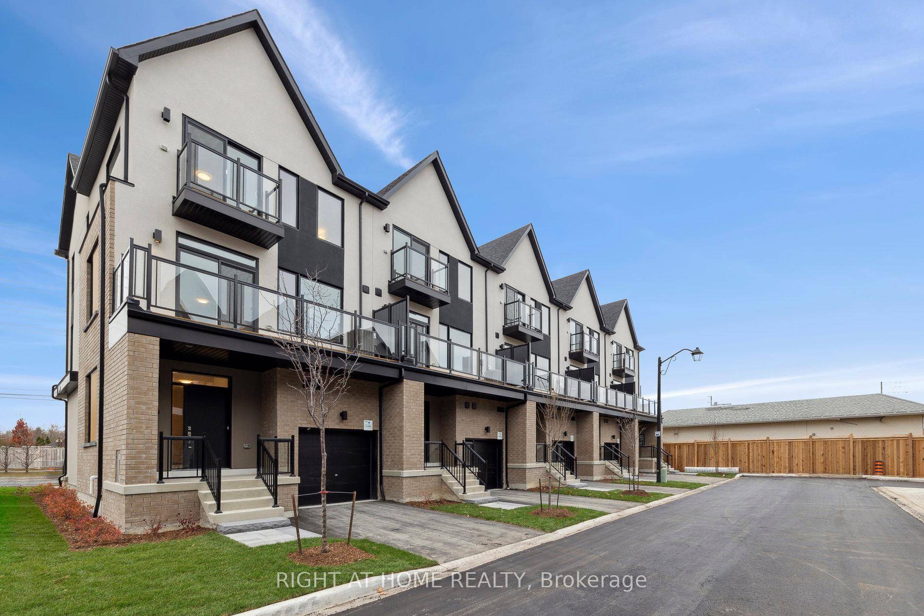 This newly repainted 3 bedroom townhome in Rolling Acres, Whitby offers a built in garage, main floor laundry, and a spacious rec room.