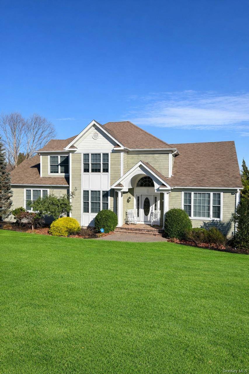 Stunning Colonial located in the desirable Riverhead Community of Rolling Woods, on the North Fork !