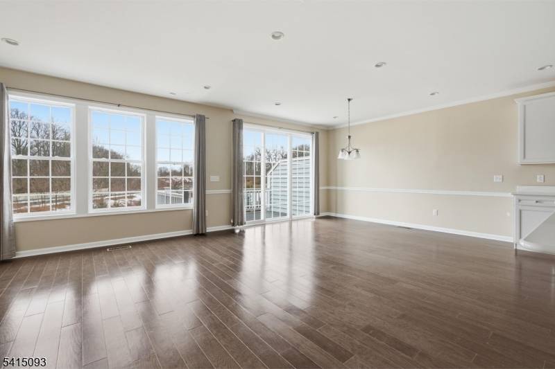 Welcome to this meticulously maintained Belmont model townhome in the highly sought after Residences at Columbia Park, completed in 2019 and offering approximately 2, 800 square feet of thoughtfully designed ...