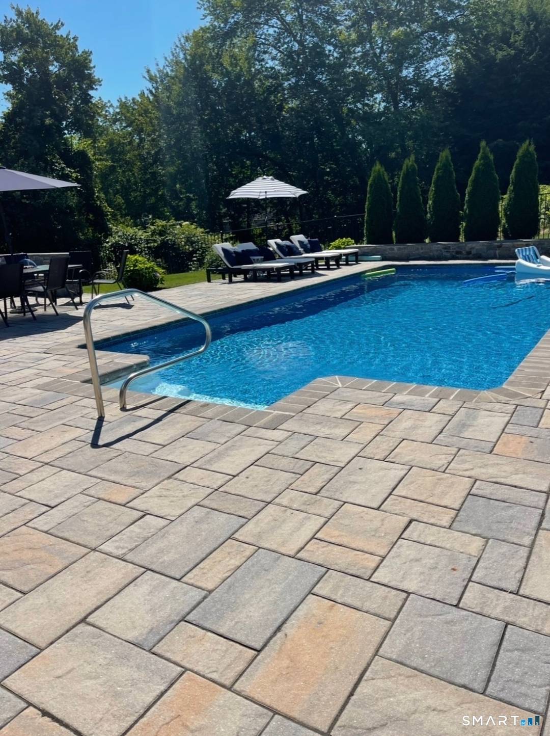 Spacious Colonial with Private Backyard Oasis Perfect for Summer Living !