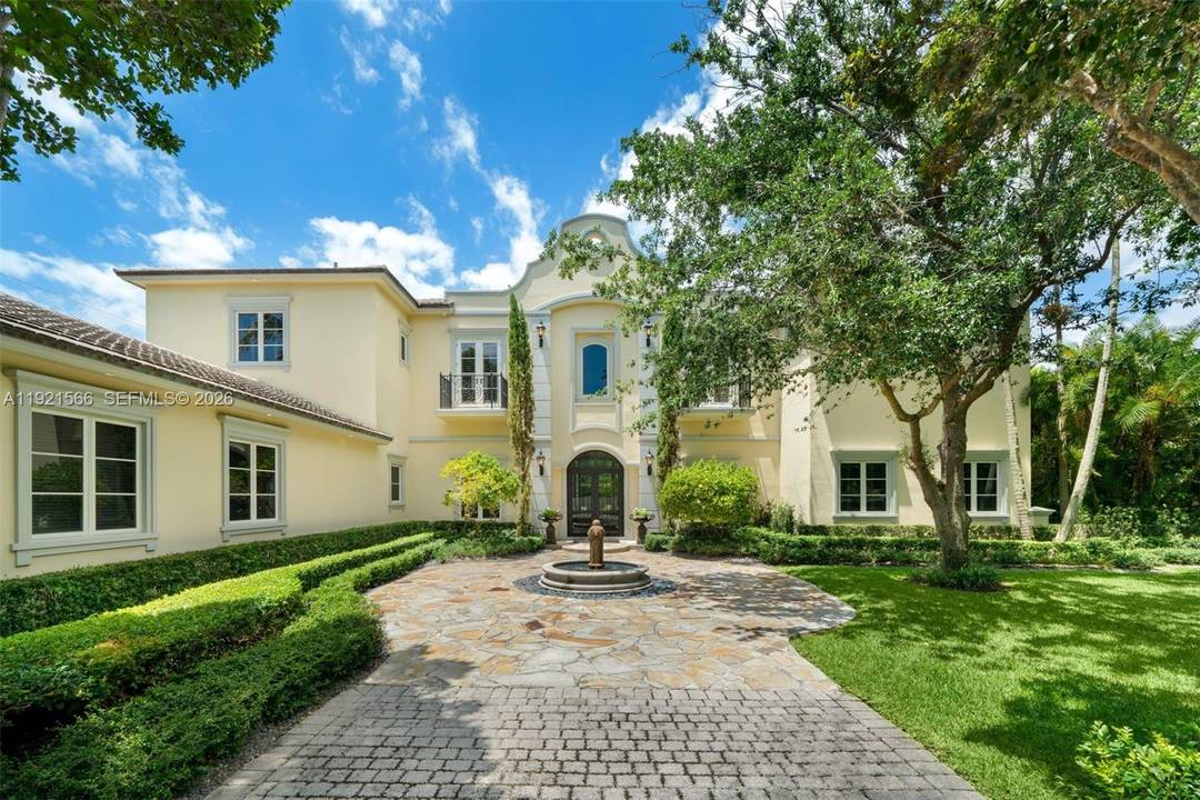 This chateau inspired 9, 289 SF, 7 BD, 8 BA gated residence boasts a meticulously designed layout on an expansive 29, 292 SF lot.