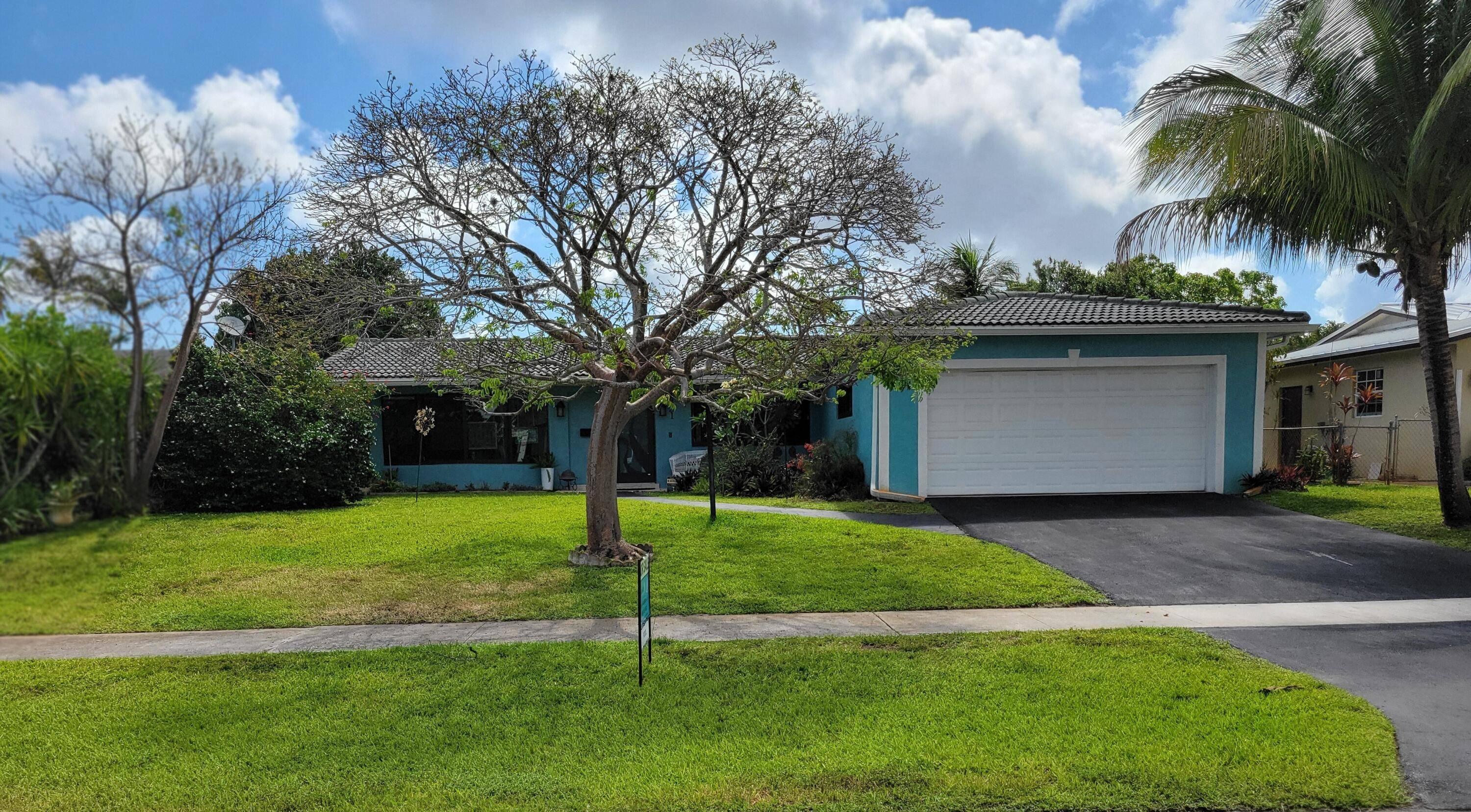 Enjoy a bit of paradise in your new heated pool and oversized yard beautifullly landscaped and private.