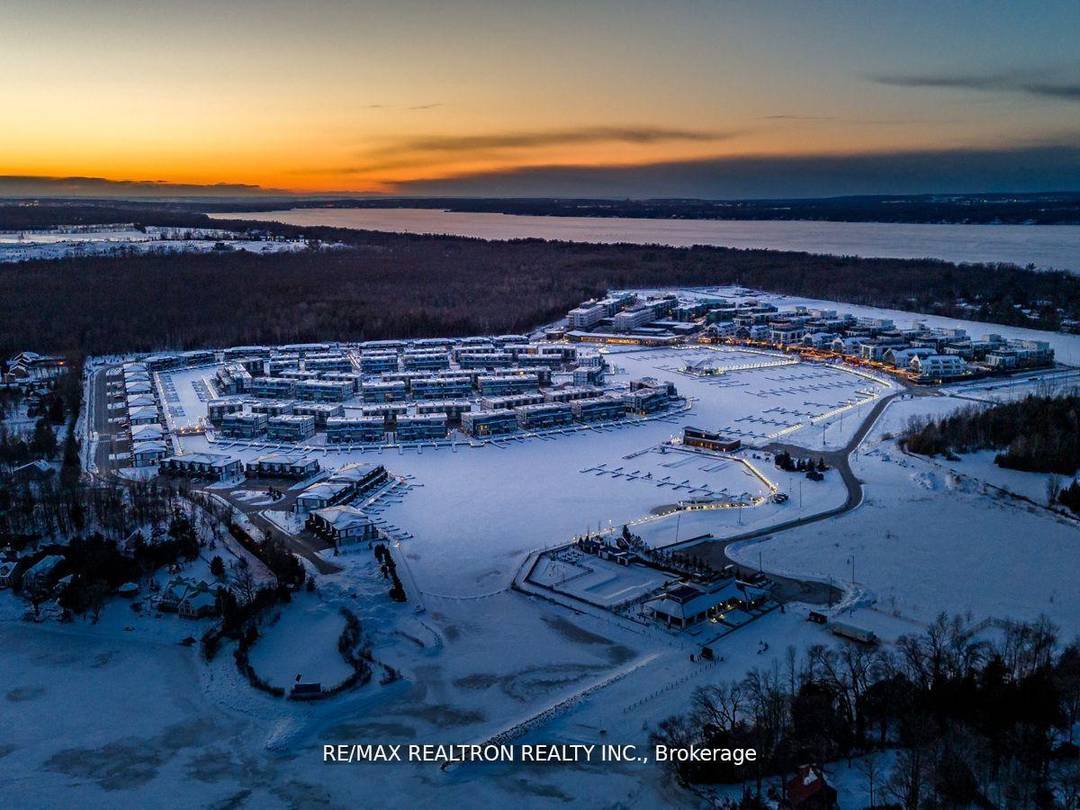 Discover the epitome of waterfront luxury with this stunning 4 bedroom, 5 bathroom townhome on the highly sought after West Island at The Harbour.