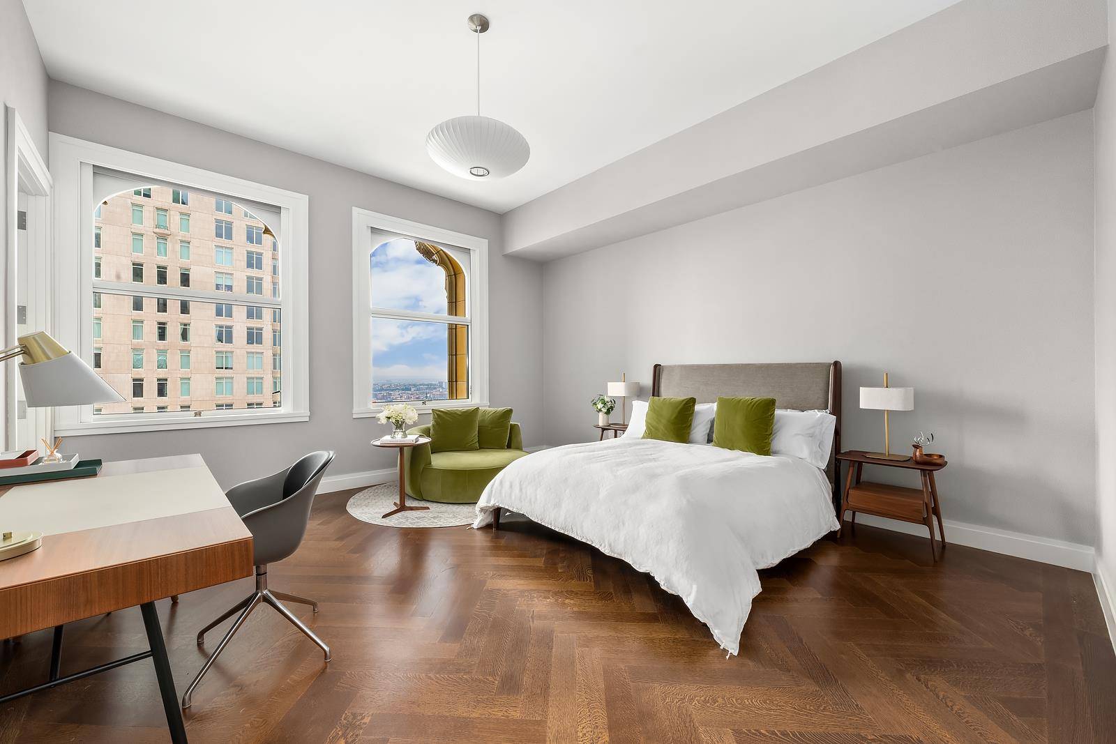 Residence 41B is a light filled retreat wrapped in the storied elegance of the Woolworth Tower.