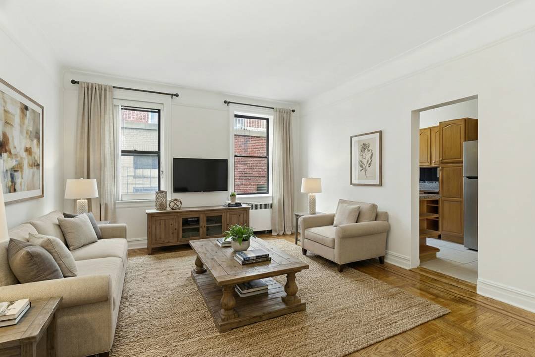 Welcome to 34 20 83rd Street, Apartment 2D a well proportioned one bedroom condo with a bonus room perfect for a home office or study, located in the heart of ...