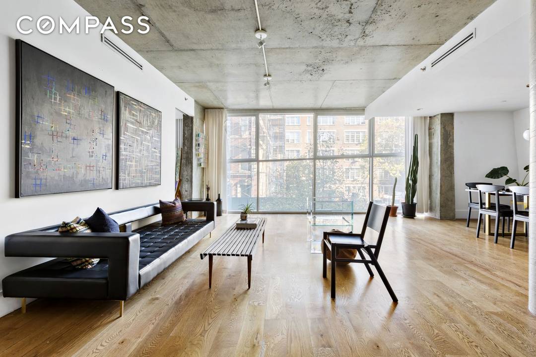 Sleek, ultra modern LES condo with refined industrial finishes and exceptional natural light.