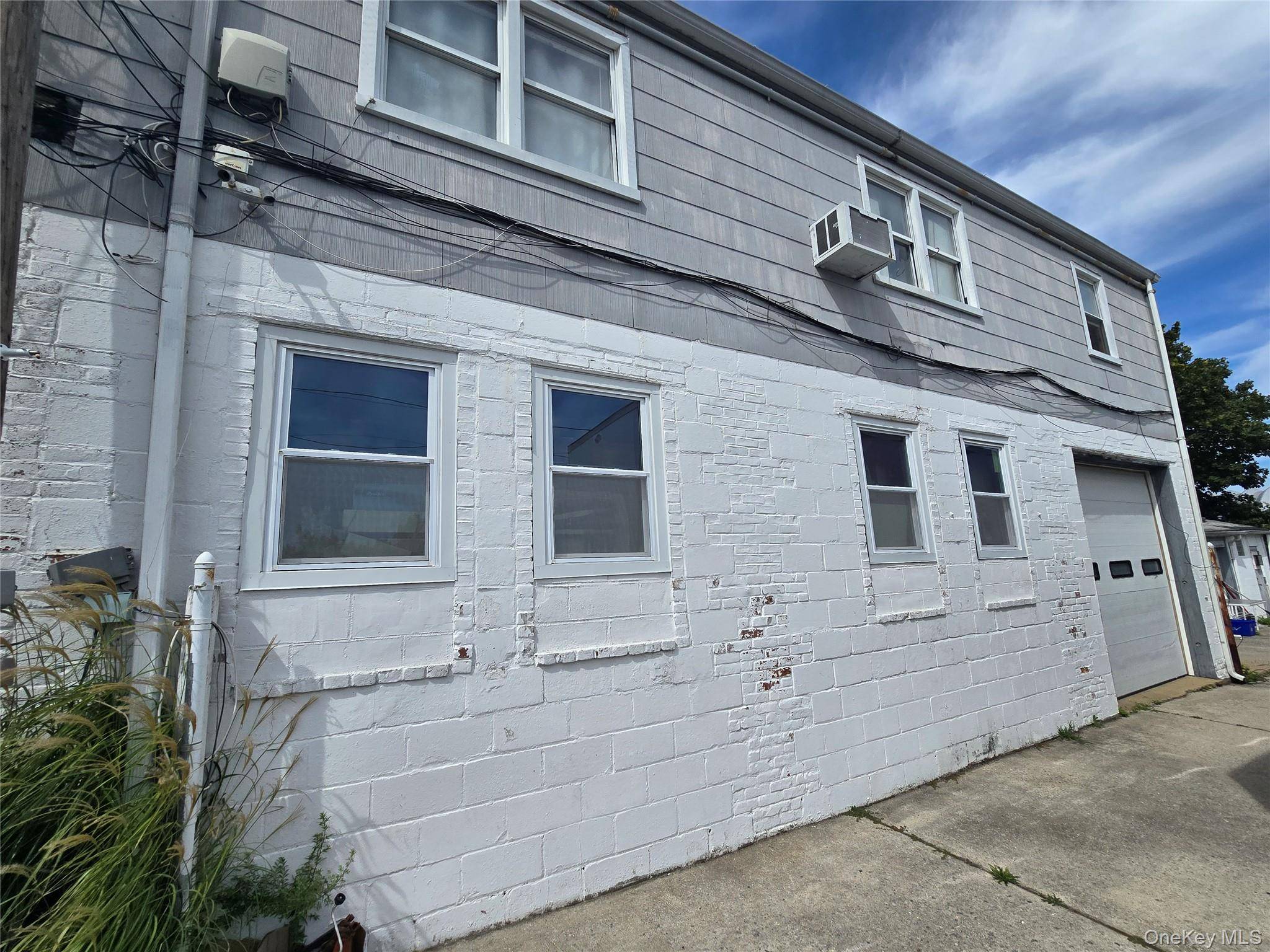 A rare opportunity to own a 5 family mixed use residential commercial property in South Baldwin.