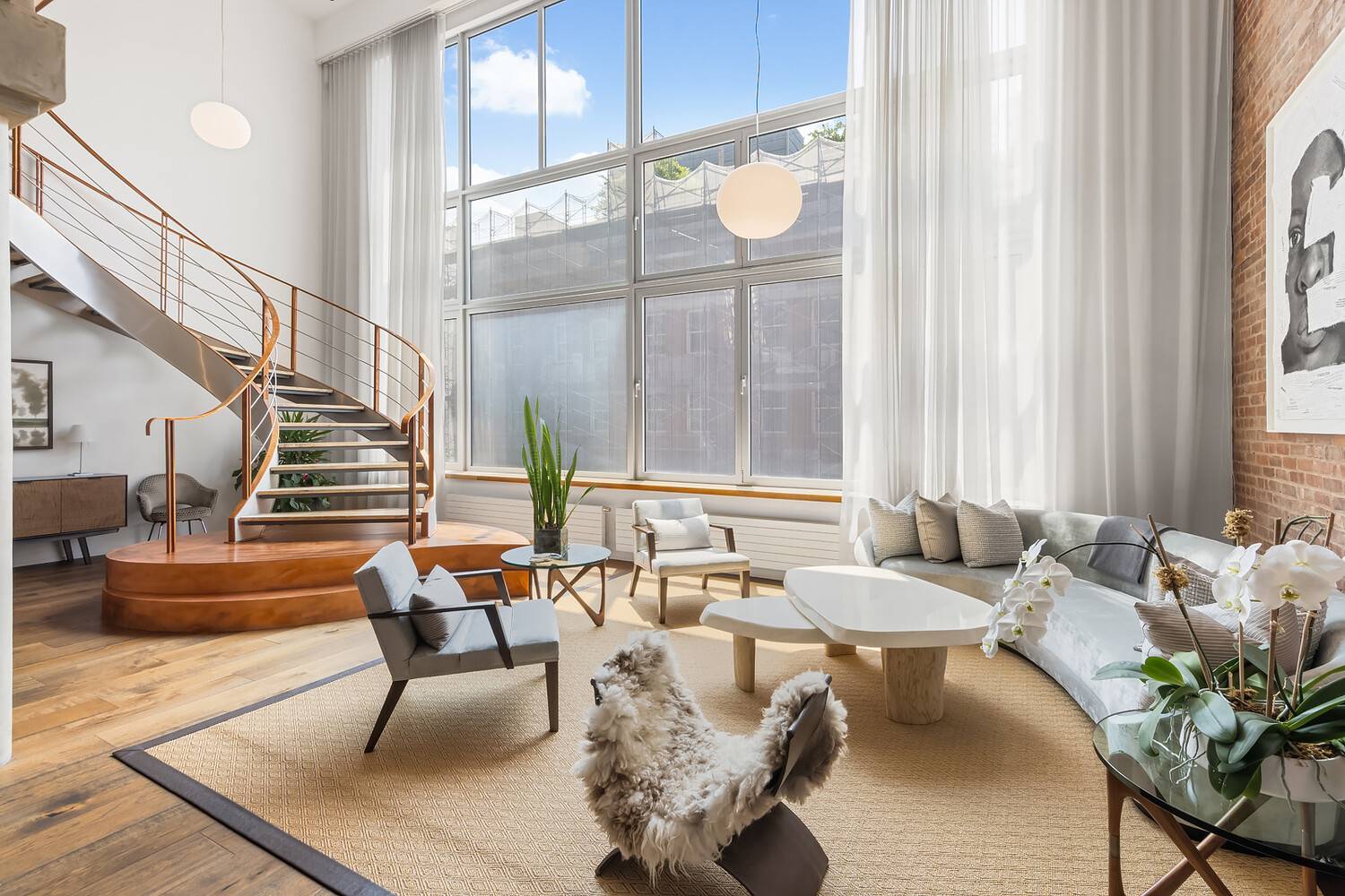 Introducing the breathtaking Dramatic Penthouse Loft, a luxurious apartment boasting exceptional features and stunning views.