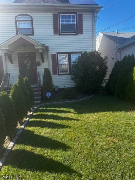 This colonial House offers 5 bedrooms and 21 2 bath rooms.