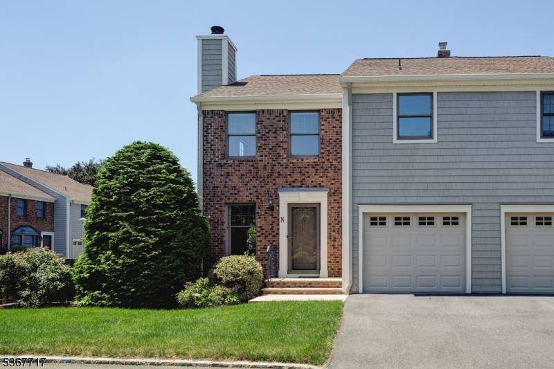 End Unit Bright and Spacious Townhome w Fireplace, Patio Finished Basement ?