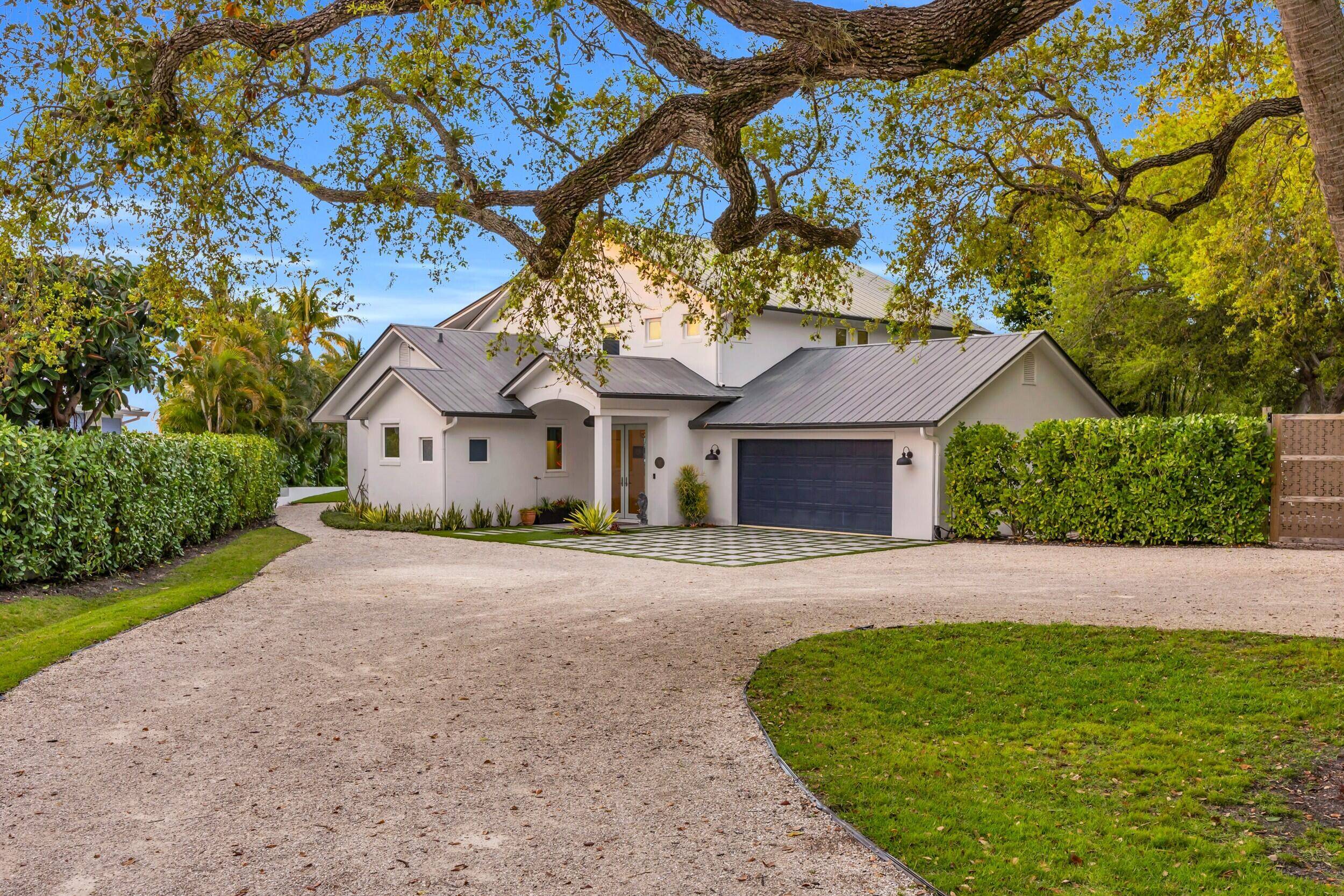 Welcome to your private waterfront retreat, where modern luxury meets serene coastal living.