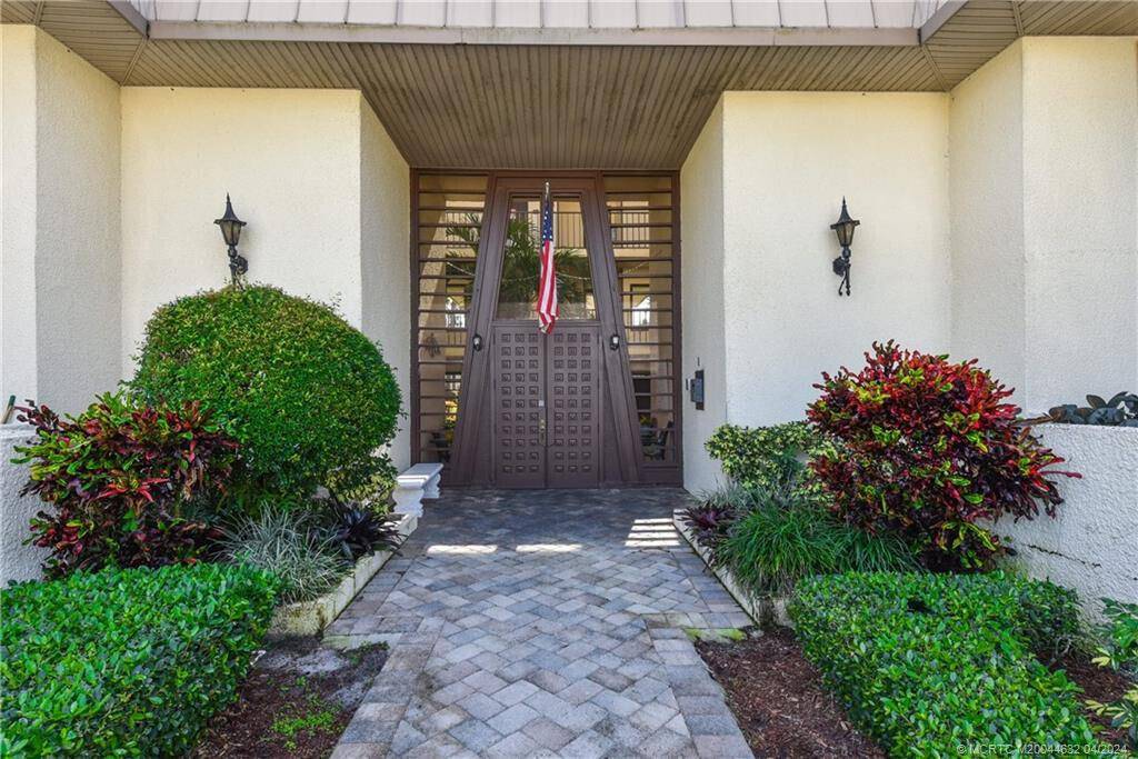 Unlock the potential of this 2 bedroom, 2 bath second floor condo in an exquisite 55 tropical gated community.
