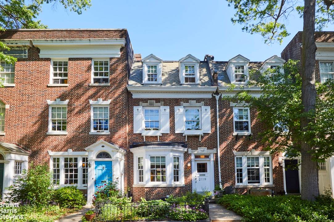2119 Albemarle Terrace is a distinguished neo Federal style single family townhouse set on one of the two quiet cul de sacs that form the Albemarle Kenmore Terrace Historic District.
