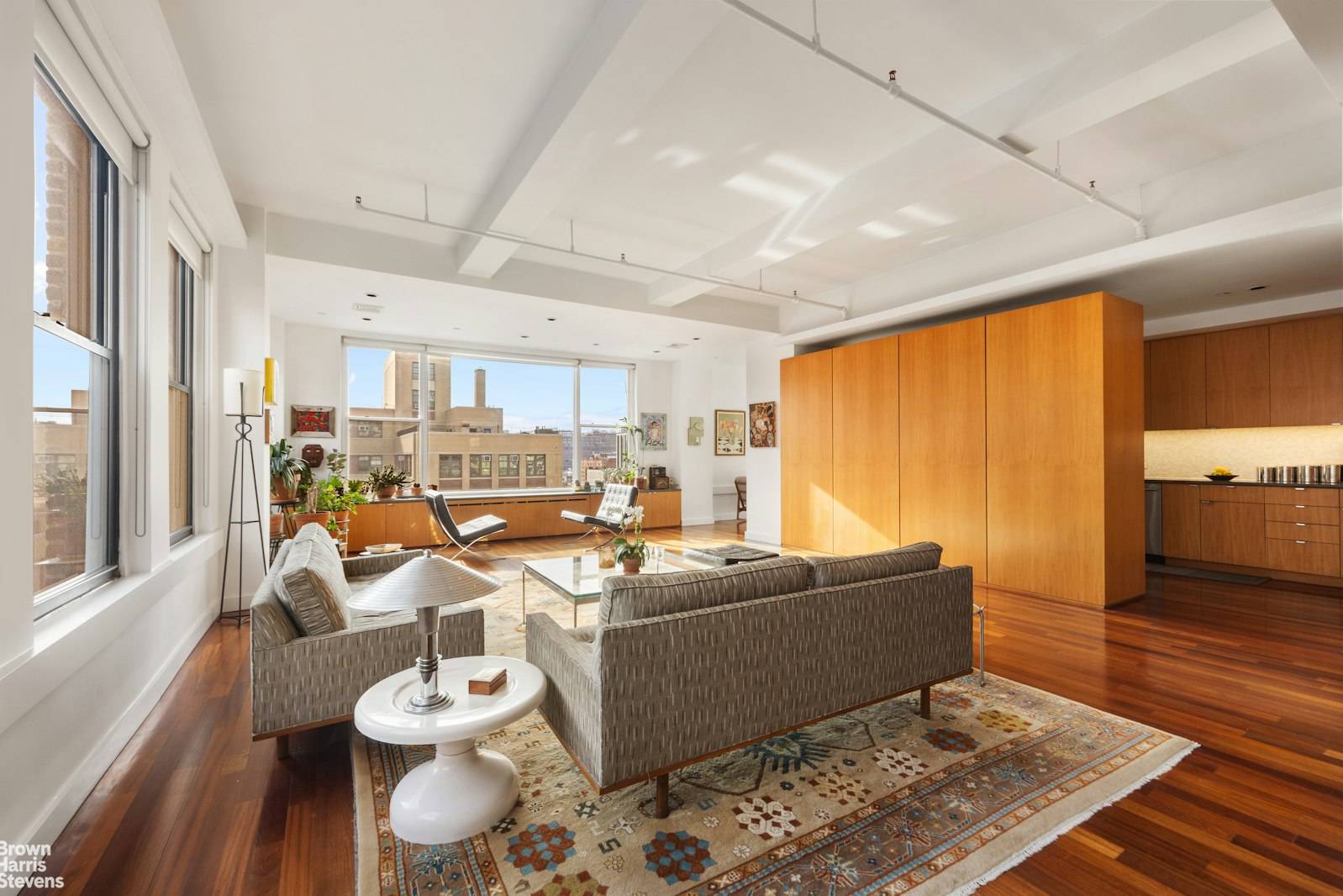 21 windows brings in.... Sunrise to Sunset, and Everything in Between Perched on the top floor of this historic prewar gem in Prime Chelsea, this sunlit loft is a rare ...