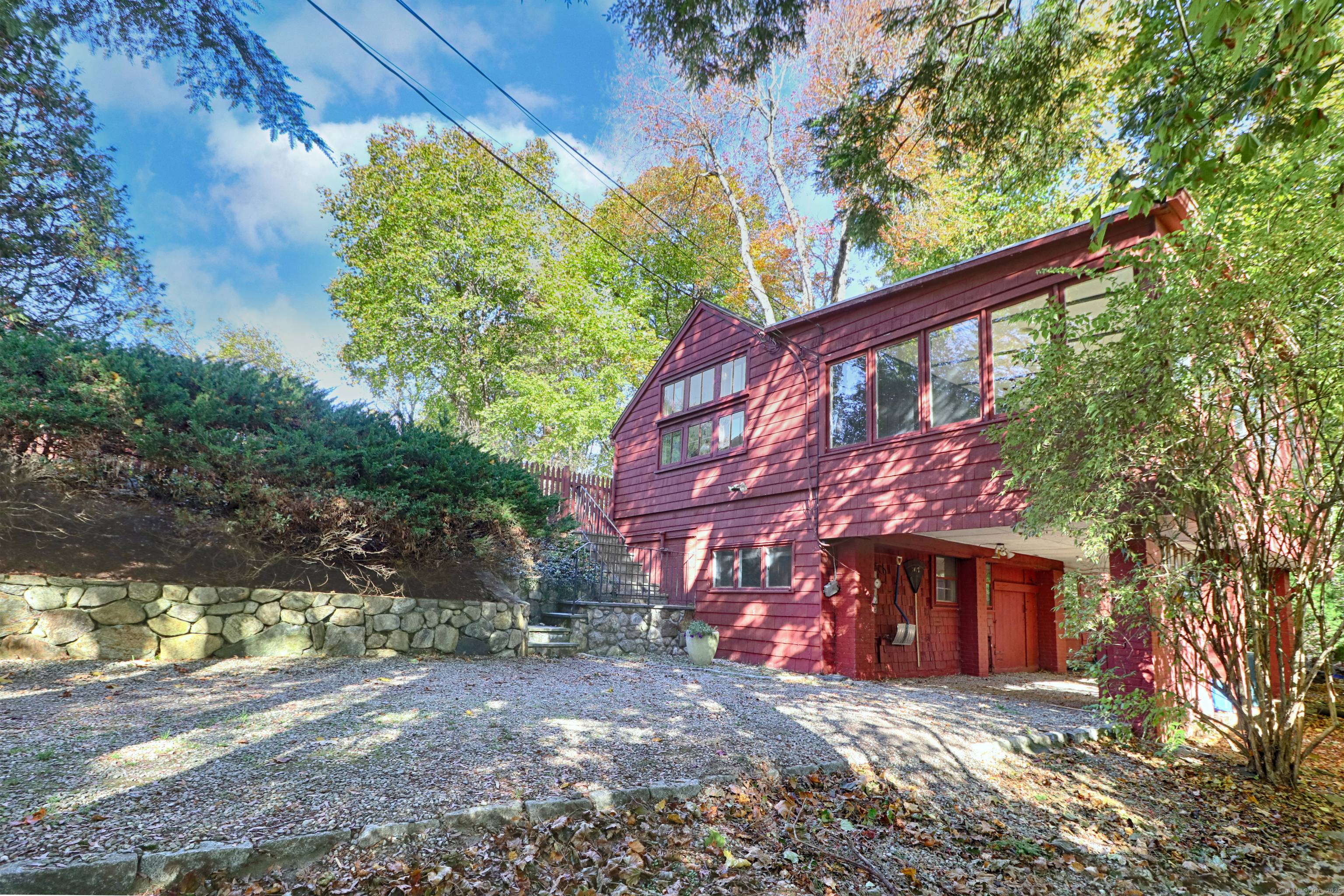 Nestled back on a. 31 Acre site is an intriguing circa 1900 converted barn carriage house.