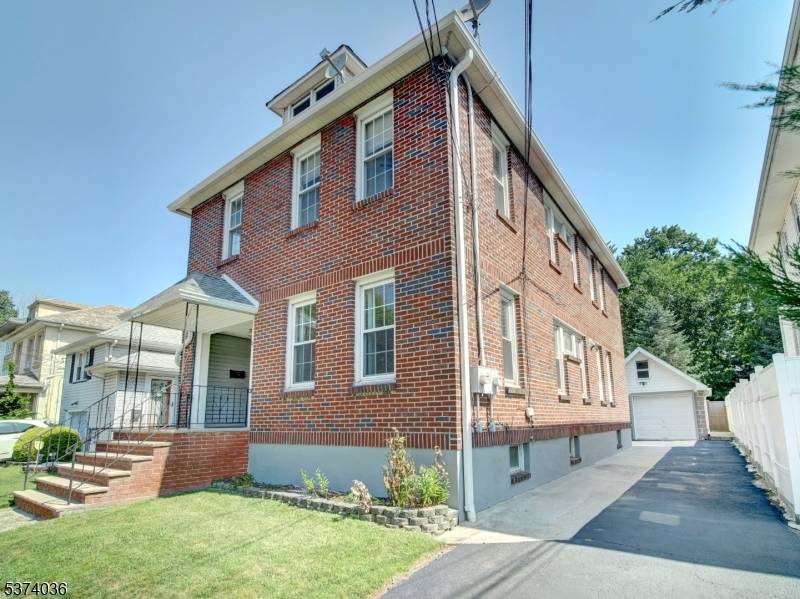 Charming and well maintained two family home in Linden, NJ !