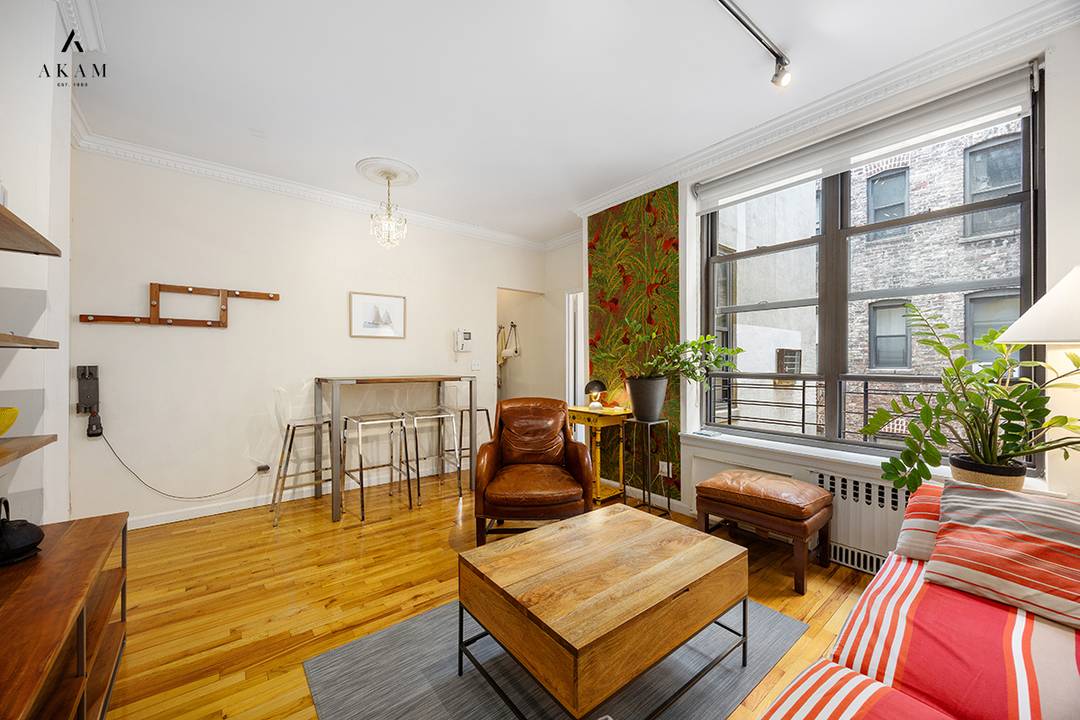 Located in a charming Parisian style landmark building, this beautifully maintained home offers the perfect blend of classic character and modern updates.