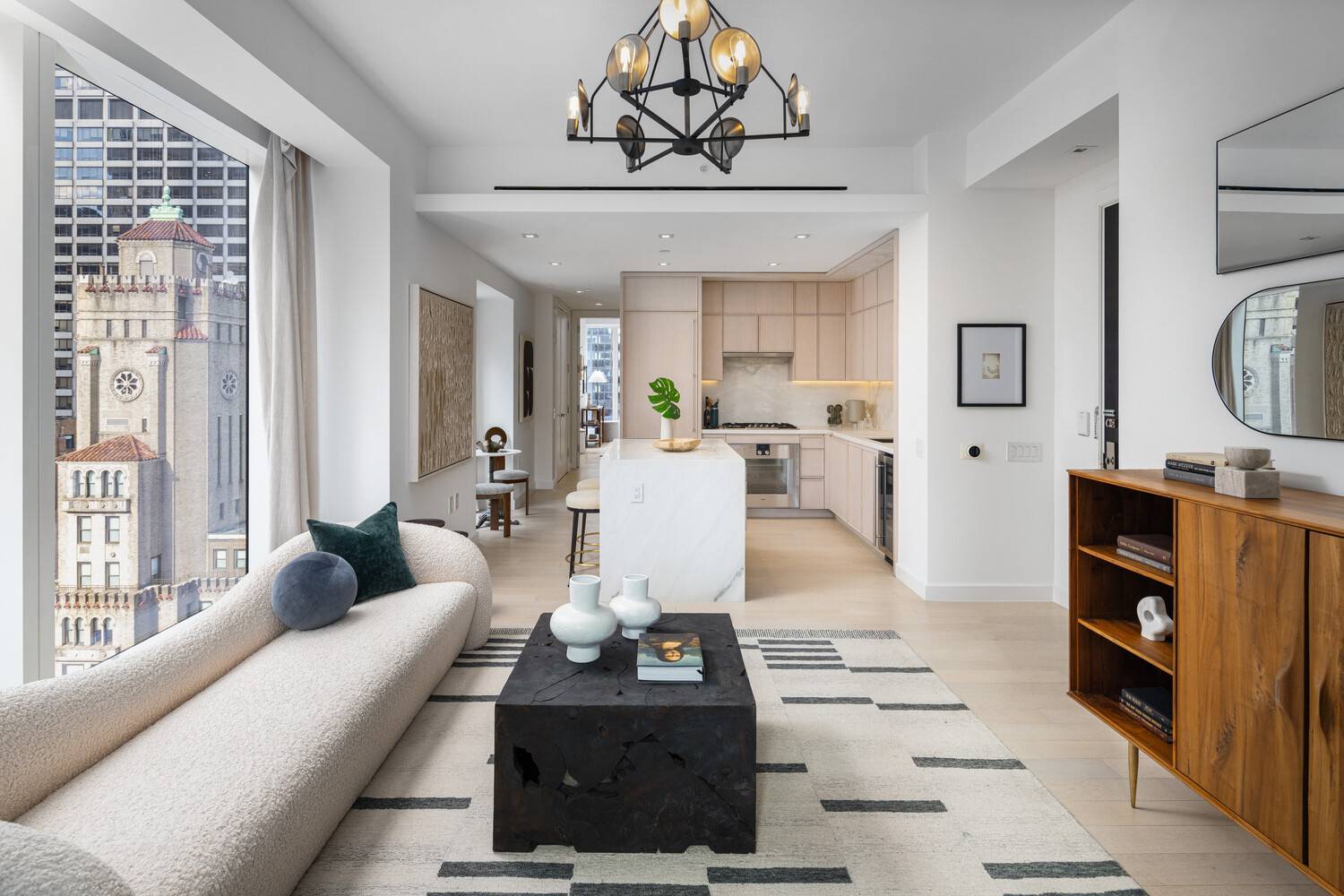 Immediate Occupancy. This expansive one bedroom, one and a half bathroom residence designed by Champalimaud offers northern, western, and southern exposures through floor to ceiling windows.