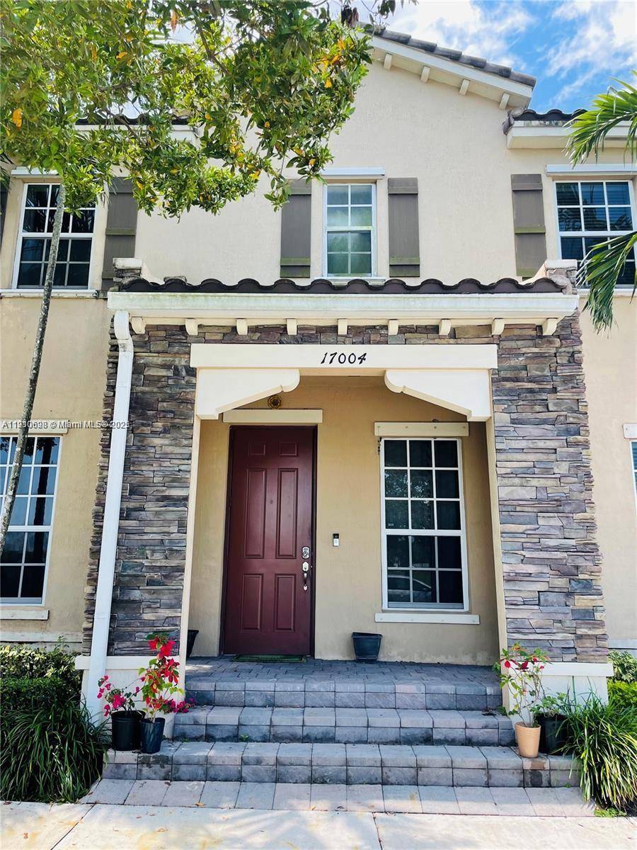 Incredible Opportunity ! This beautiful townhome includes a complete apartment in the rear perfect for a family member or generating rental income.