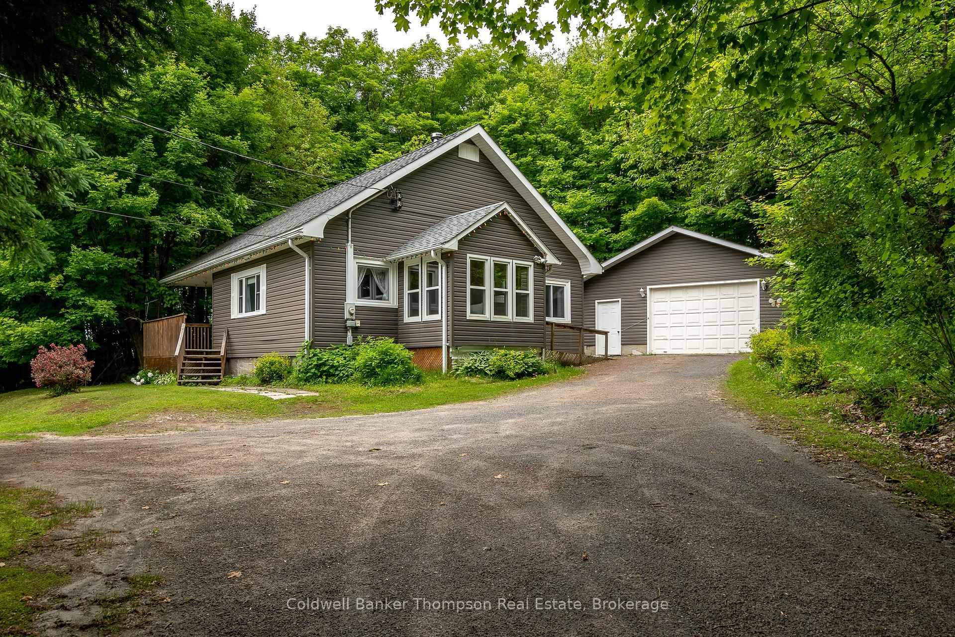 Amazing opportunity ! Set well back from the road on over 1 acre with 170 feet of frontage, this property offers space, privacy, and excellent curb appeal with low maintenance ...