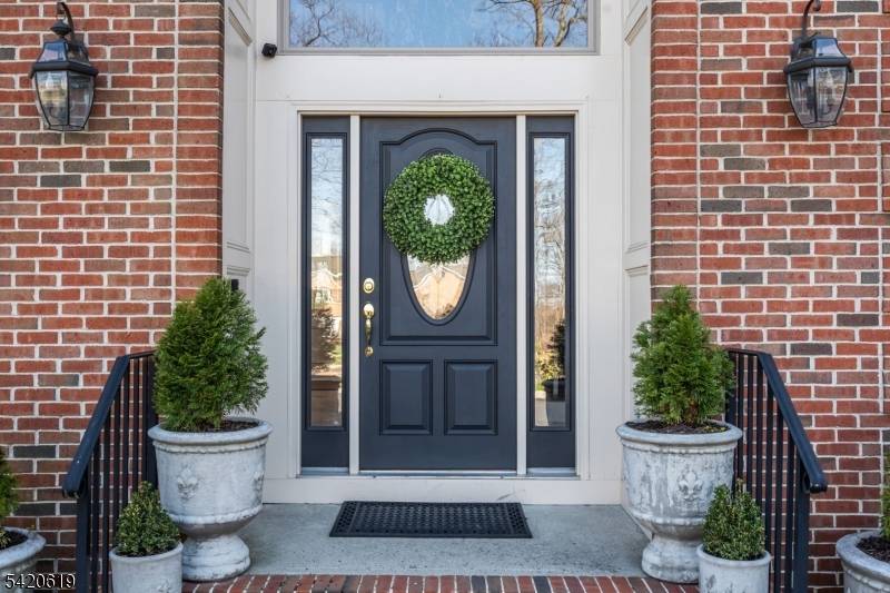 Set at the end of a private cul de sac, this exceptional home is a true statement of elegance, scale, and refined design.