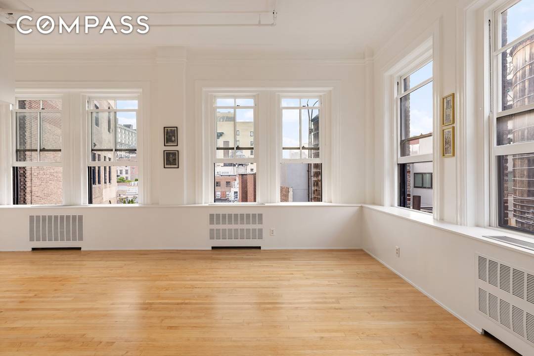 A rare opportunity to own this one of a kind, spacious, light filled Manhattan landmark apartment with expansive skyline views, high ceilings and 15 huge windows lining three sides.