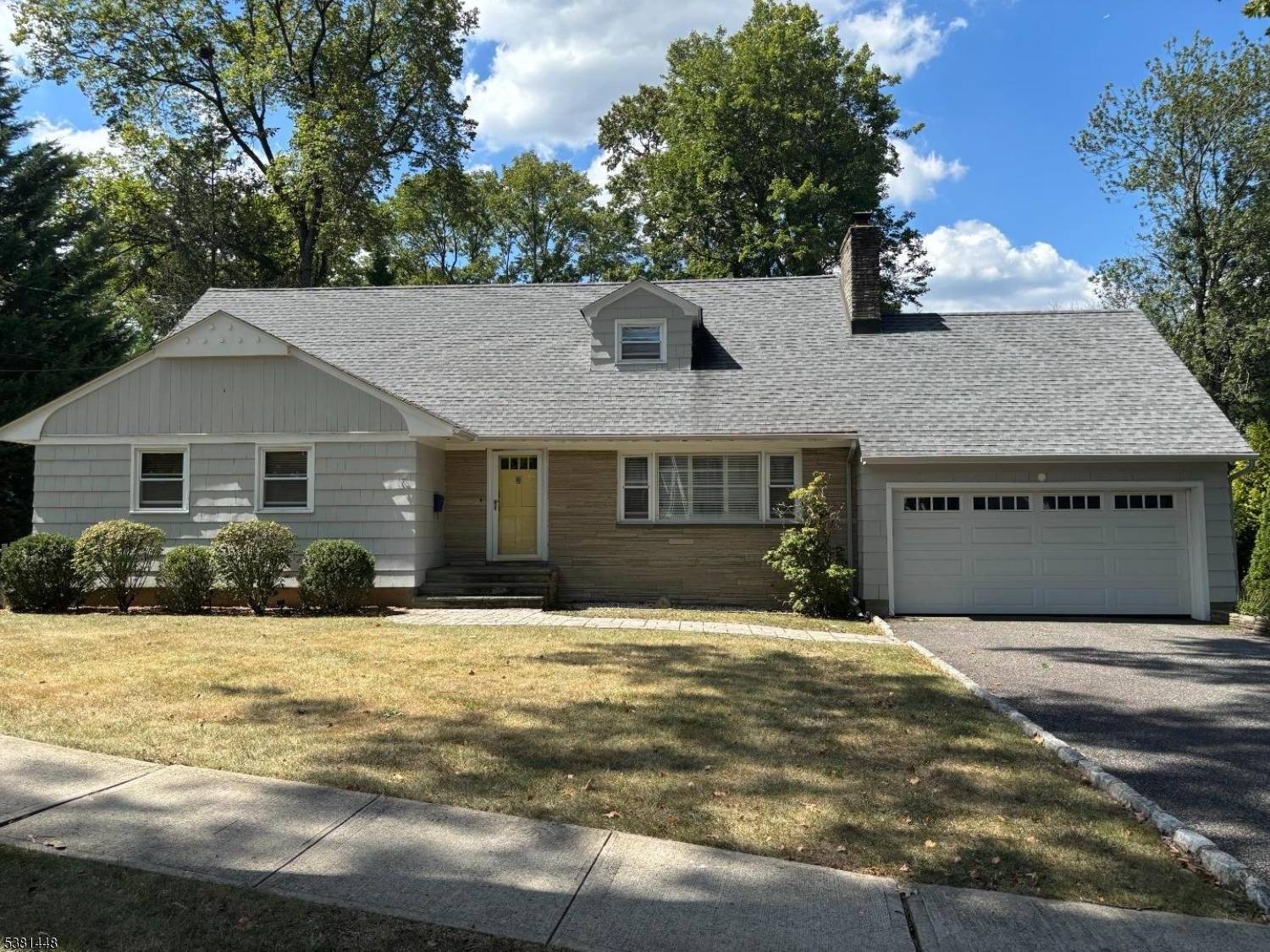 Perfectly positioned on one of Chatham's most sought after streets, just blocks from town, train, and top rated schools, this deceptively spacious 5 bedroom, 3.